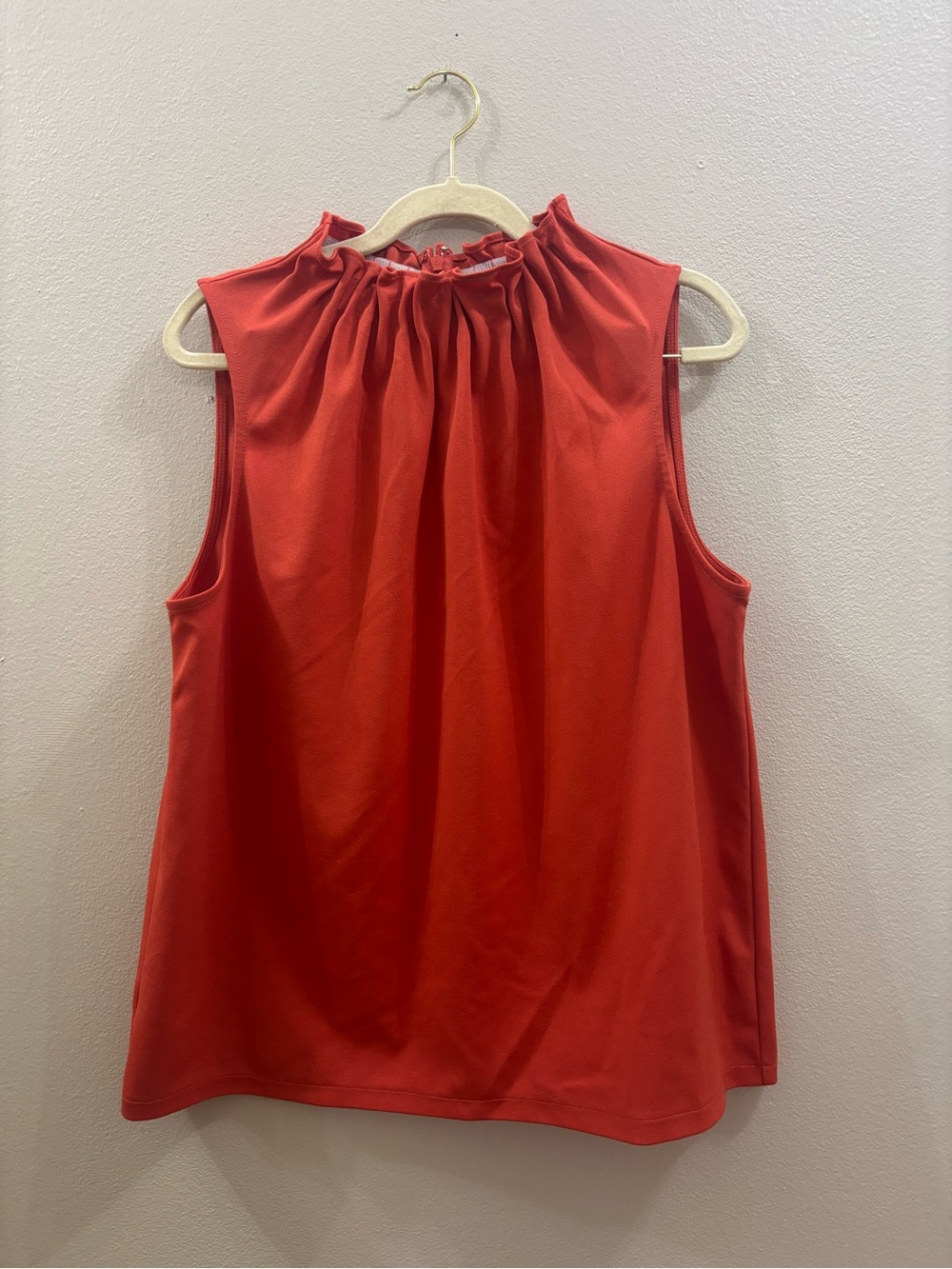 Ann Taylor sleeveless top with a gathered high ruffle neckline and a relaxed fit